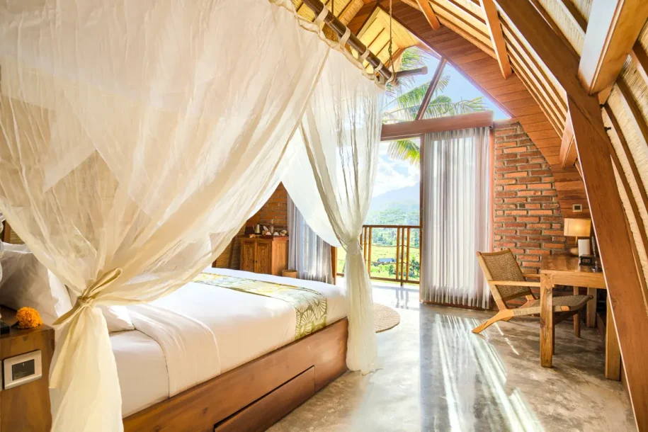 sidemen-airbnb-villa-uma-dewi-sri-bedroom-bed-and-workspace