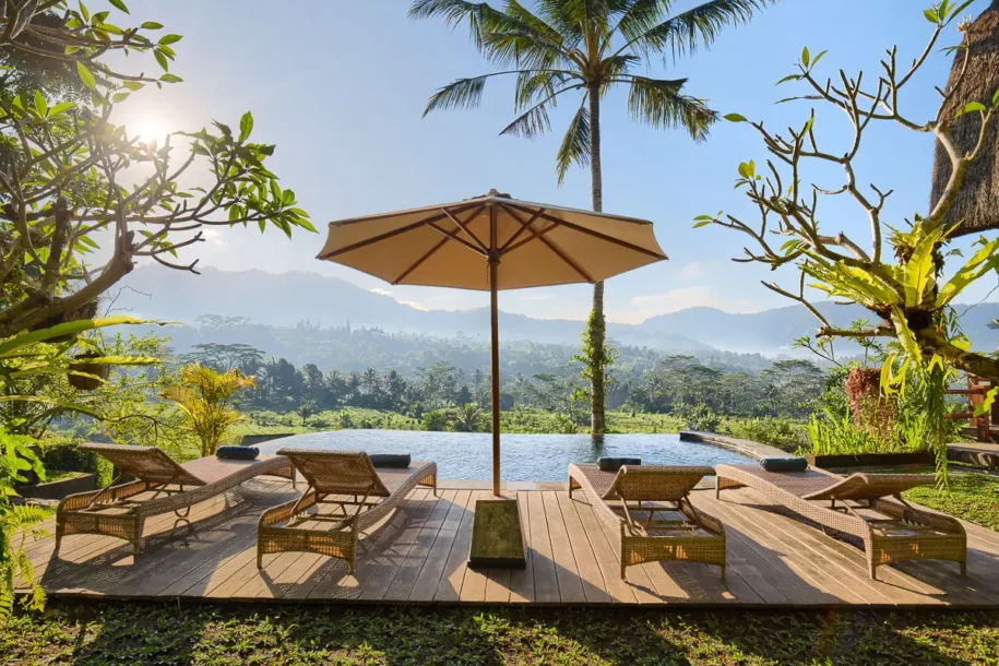 sidemen-airbnb-villa-uma-dewi-sri-pool-sunbeds-umbrella